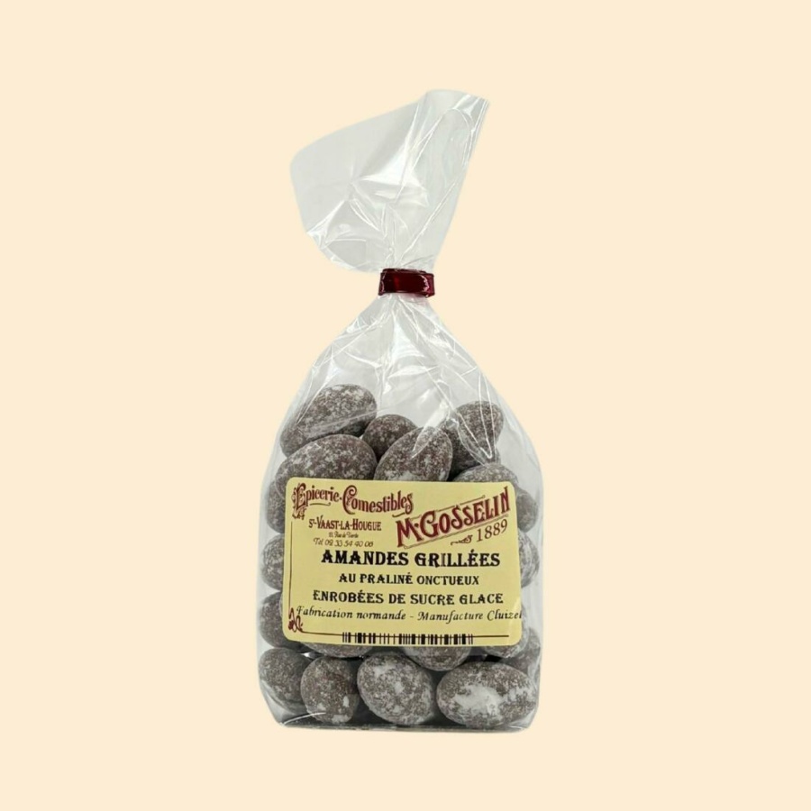 Amandes grillées au praliné onctueux enrobées de sucre glace